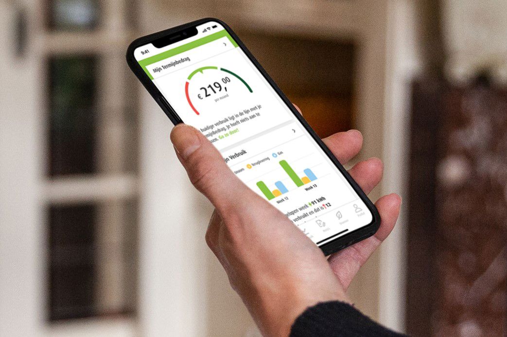 Inzoom op een hand met smartphone met Greenchoice App